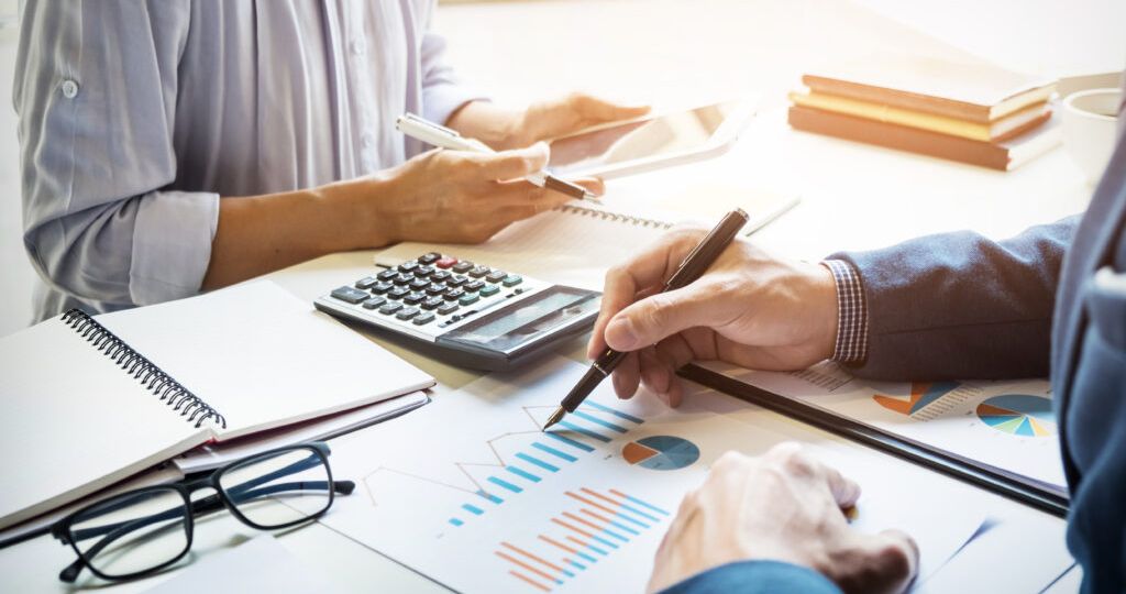 business man financial inspector and secretary making report, ca